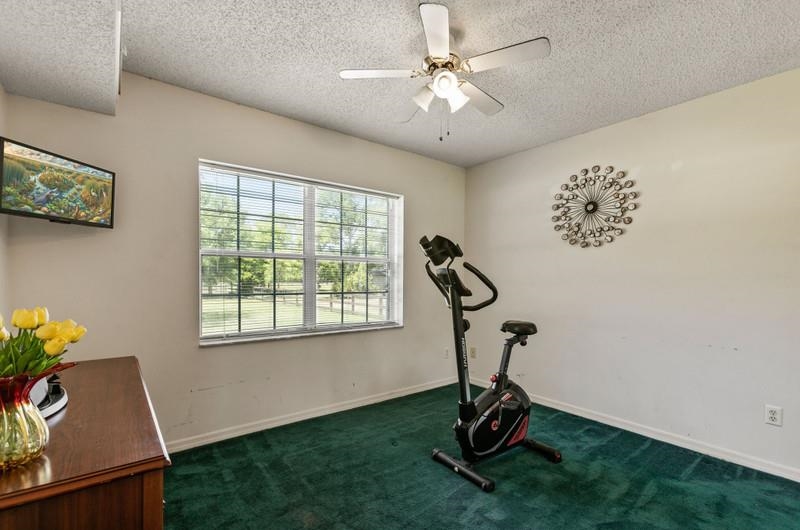 173 Stokes Landing Road St. Augustine, FL 32095 - Photo 21 of 71 a view of a room with gym equipment