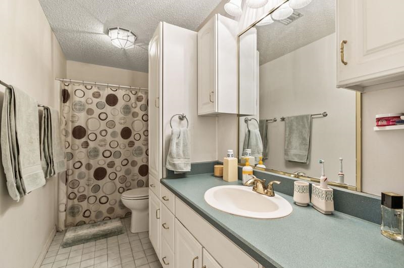 173 Stokes Landing Road St. Augustine, FL 32095 - Photo 28 of 71 a bathroom with a double vanity sink mirror and shower