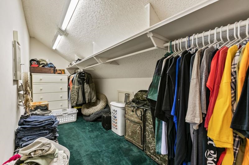 173 Stokes Landing Road St. Augustine, FL 32095 - Photo 29 of 71 a view of walk in closet with clothes and shoes
