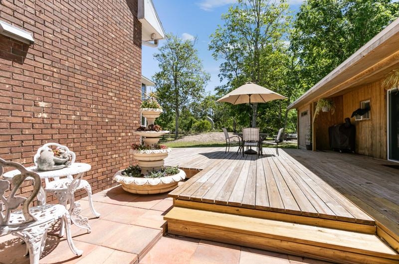 173 Stokes Landing Road St. Augustine, FL 32095 - Photo 35 of 71 a view of outdoor space yard deck patio and fire pit