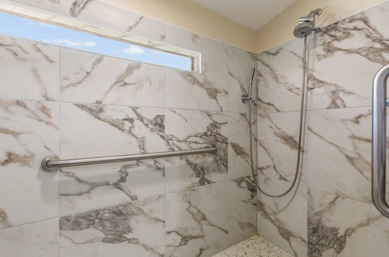 173 Stokes Landing Road St. Augustine, FL 32095 - Photo 40 of 71 a dirty bathroom with a shower