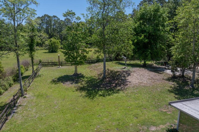 173 Stokes Landing Road St. Augustine, FL 32095 - Photo 45 of 71 a view of a park with large trees