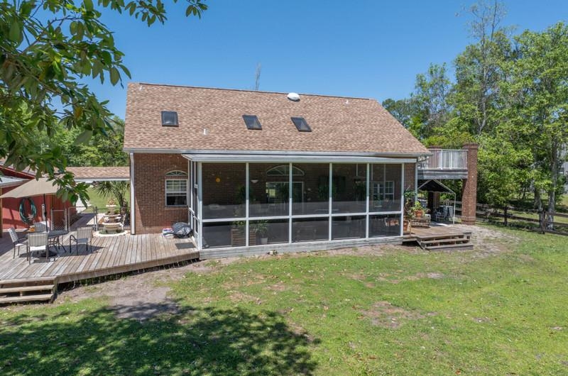173 Stokes Landing Road St. Augustine, FL 32095 - Photo 47 of 71 a house view with a garden space