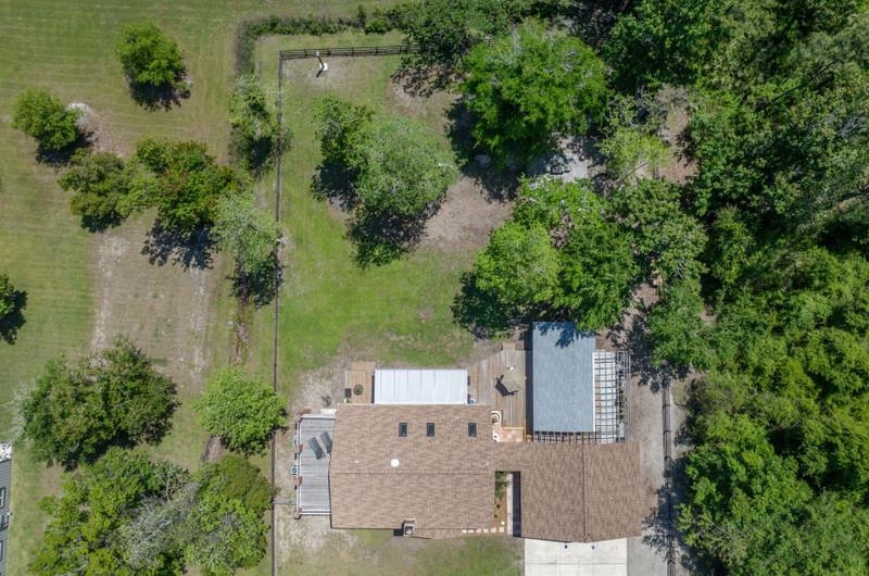 173 Stokes Landing Road St. Augustine, FL 32095 - Photo 60 of 71 an aerial view of a house with outdoor space and trees all around