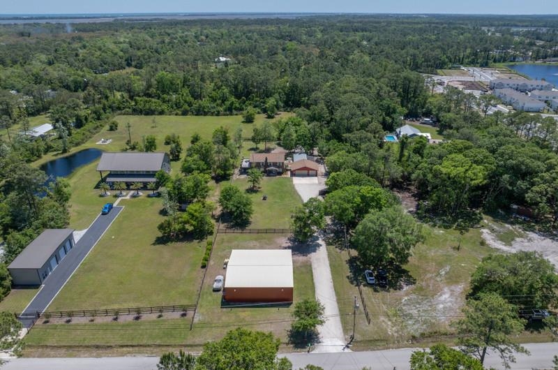 173 Stokes Landing Road St. Augustine, FL 32095 - Photo 7 of 71 an aerial view of a house with a yard