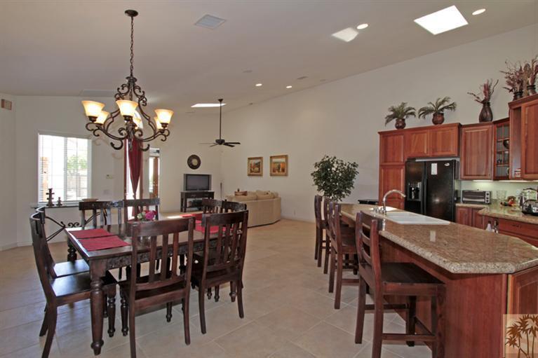 79175 Bermuda Dunes Drive Bermuda Dunes, CA 92203 - Photo 1 of 21 a view of a dining room with furniture and chandelier