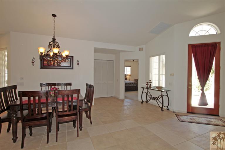 79175 Bermuda Dunes Drive Bermuda Dunes, CA 92203 - Photo 5 of 21 a view of a dining room with furniture and window