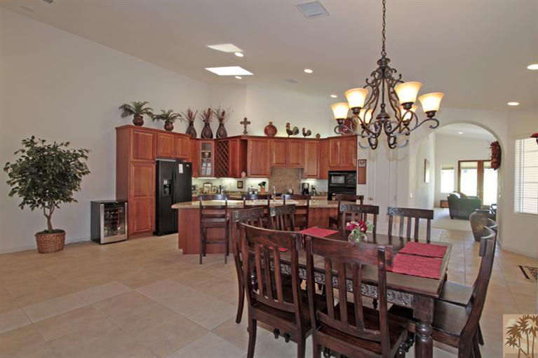 79175 Bermuda Dunes Drive Bermuda Dunes, CA 92203 - Photo 8 of 21 a view of a dining room with furniture and chandelier