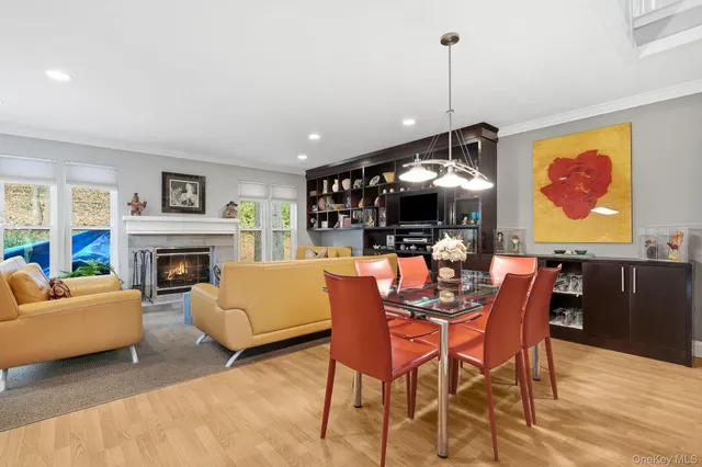 a view of a livingroom with furniture and a fireplace