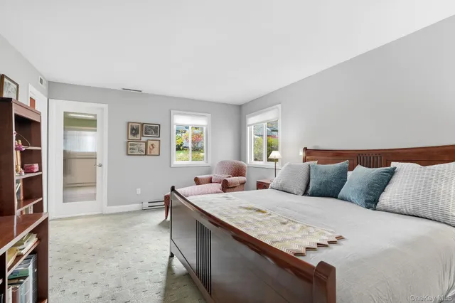 a living room with a couch and a window
