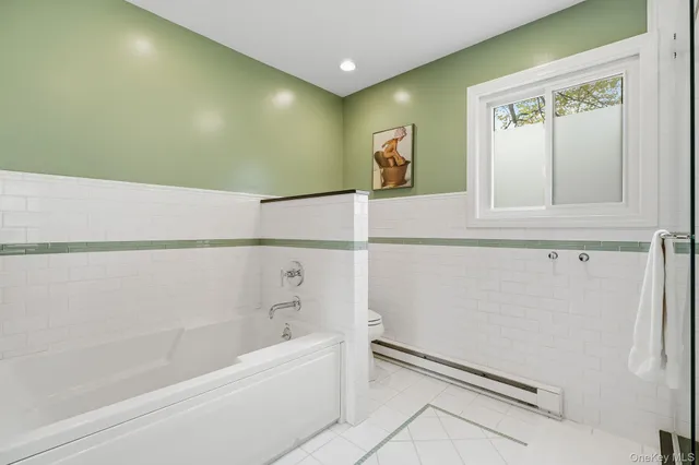 a bathroom with a bathtub