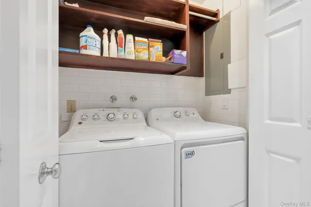 a utility room with dryer and washer