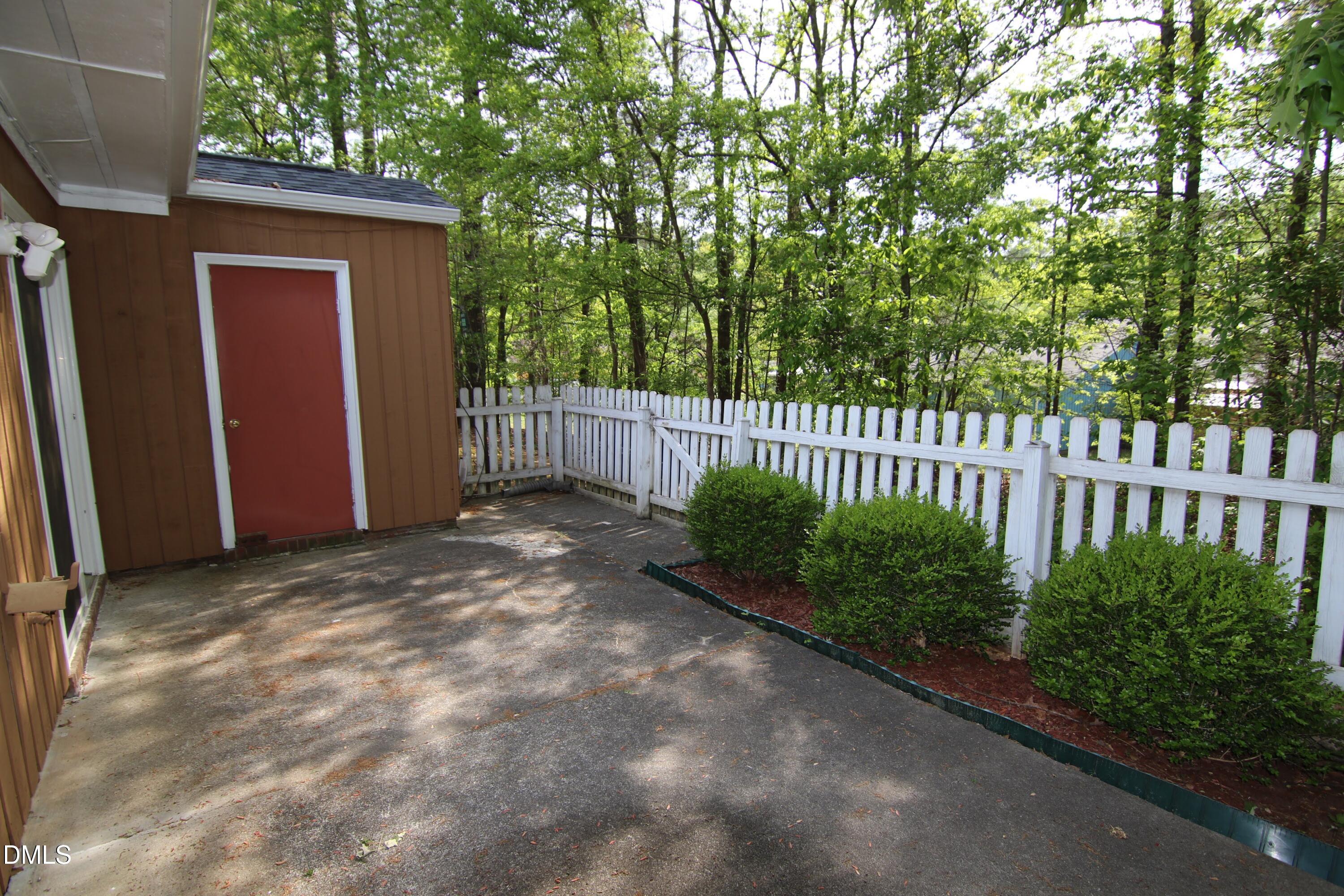 84 Candytuff Lane Durham, NC 27713 - Photo 22 of 23 a view of backyard and porch