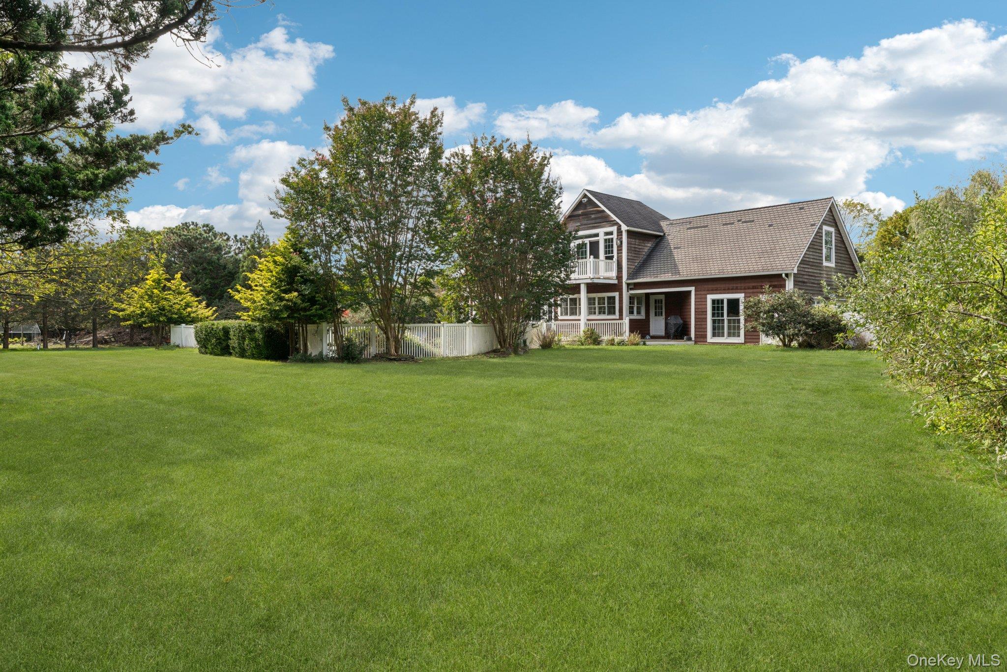 12 Laila Lane Remsenburg, NY 11960 - Photo 42 of 50 a view of a house with a big yard
