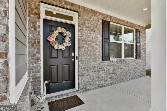 a view of a terrace with sitting area