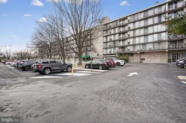 a view of a cars parked in front of a building