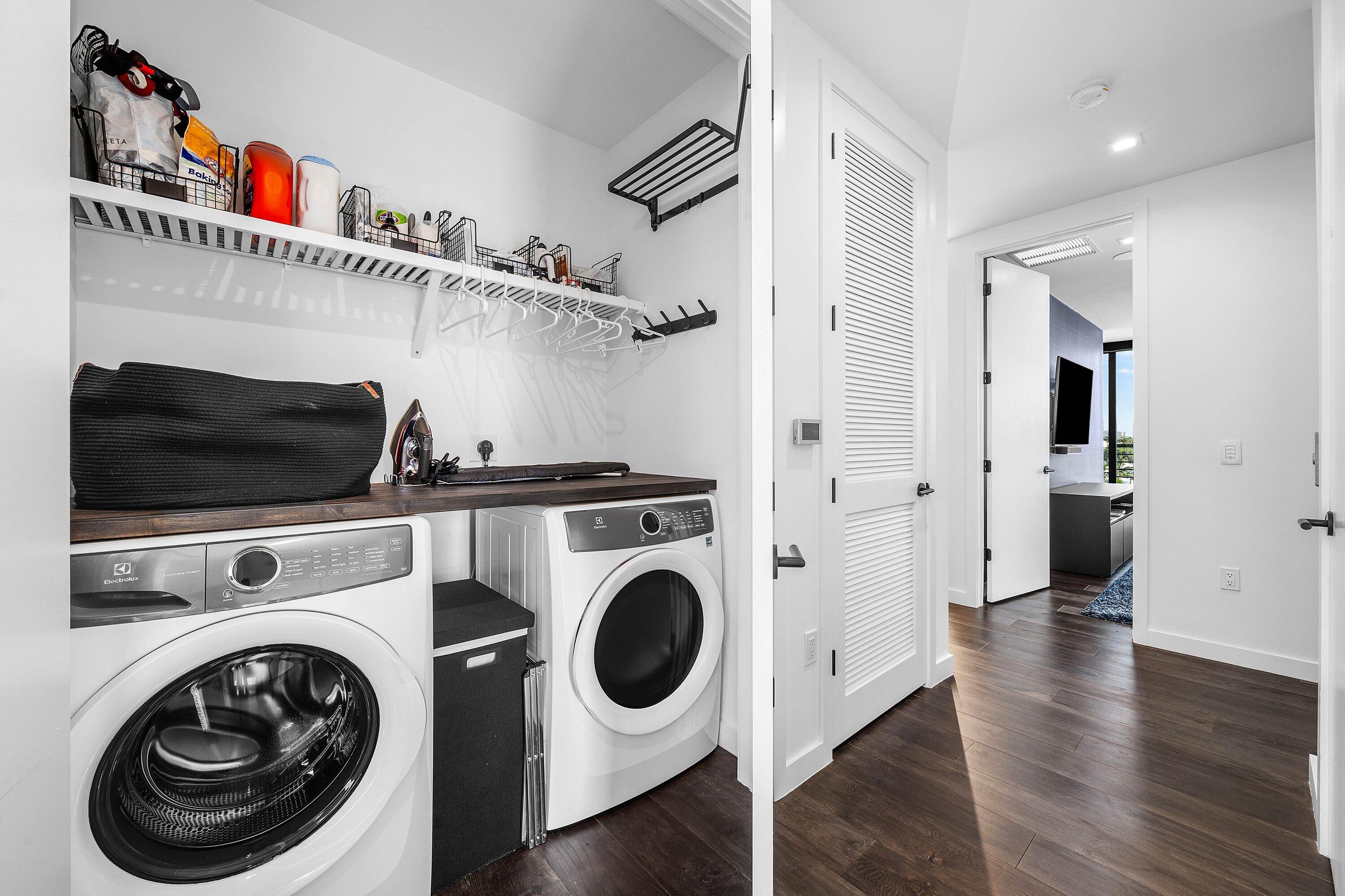 11501 Old Ocean Boulevard Ocean Ridge, FL 33435 - Photo 39 of 70 a view of a hallway with washer and dryer