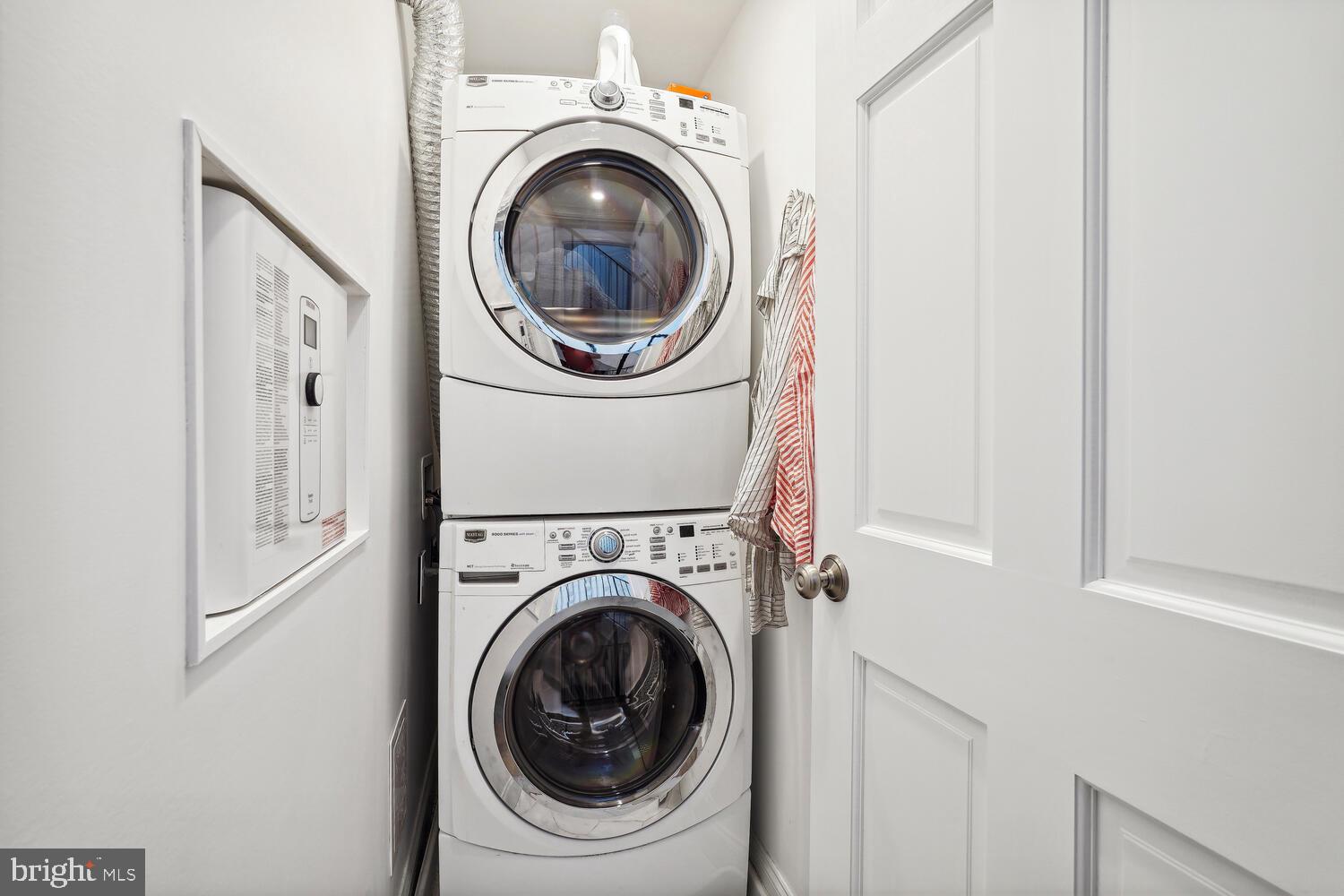 2242 Ontario Road Northwest, Unit 3 Washington, DC 20009 - Photo 20 of 20 a utility room with dryer and washer
