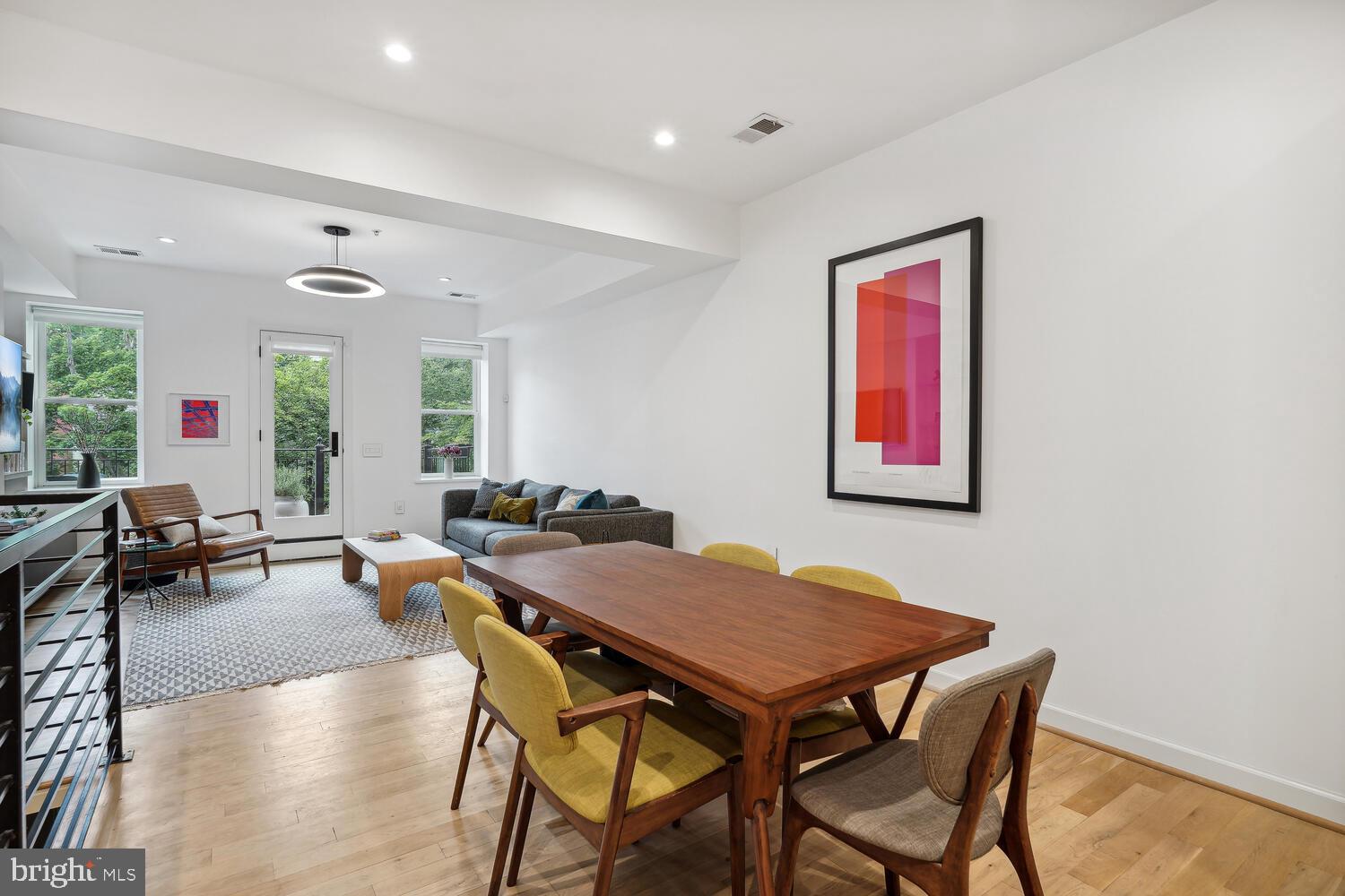 2242 Ontario Road Northwest, Unit 3 Washington, DC 20009 - Photo 3 of 20 a view of a dining room with furniture