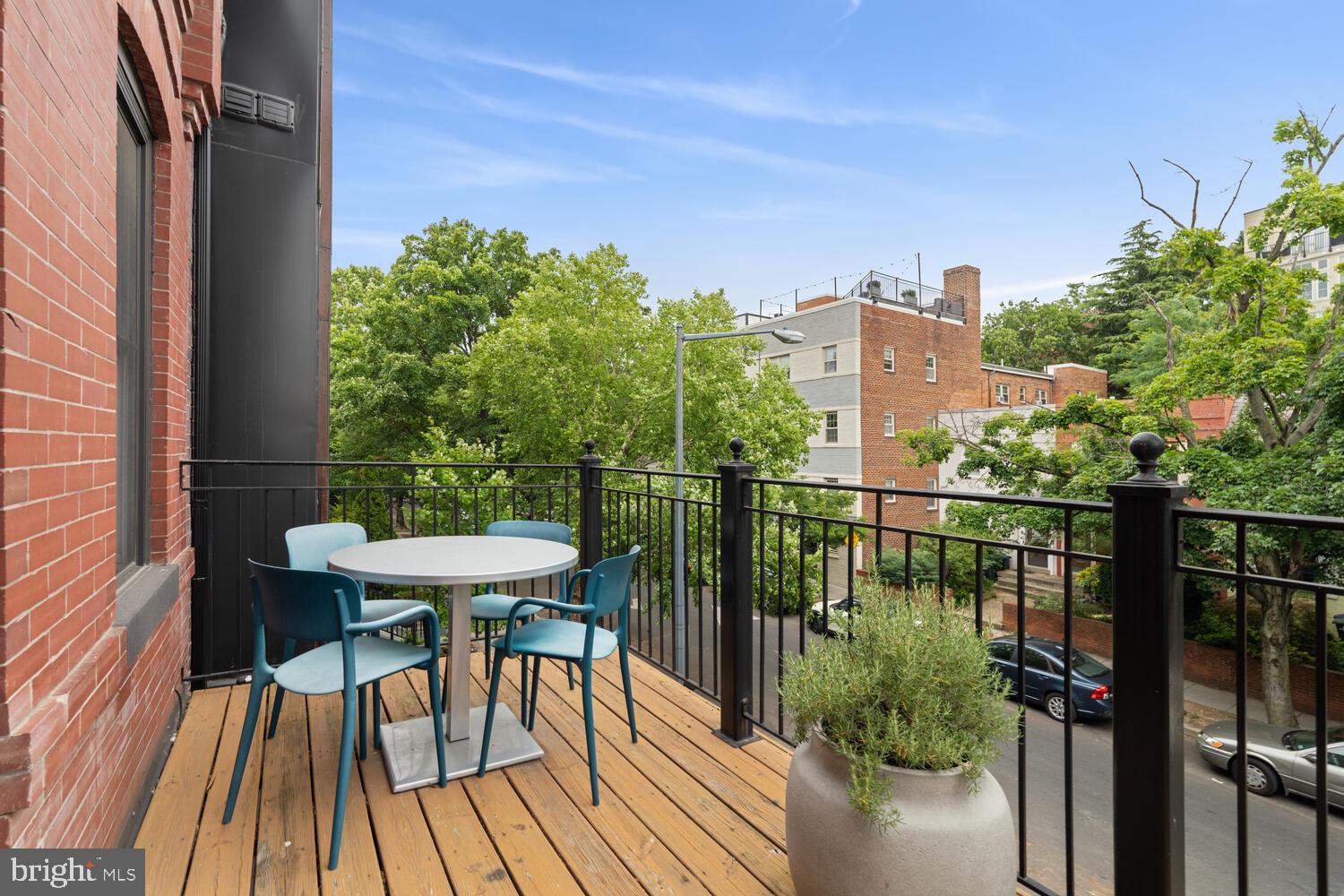 2242 Ontario Road Northwest, Unit 3 Washington, DC 20009 - Photo 7 of 20 a view of a balcony with chairs