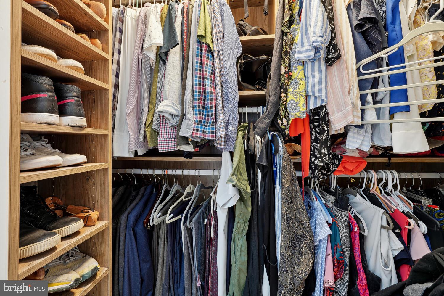 2242 Ontario Road Northwest, Unit 3 Washington, DC 20009 - Photo 10 of 20 a view of walk in closet with clothes and shoes
