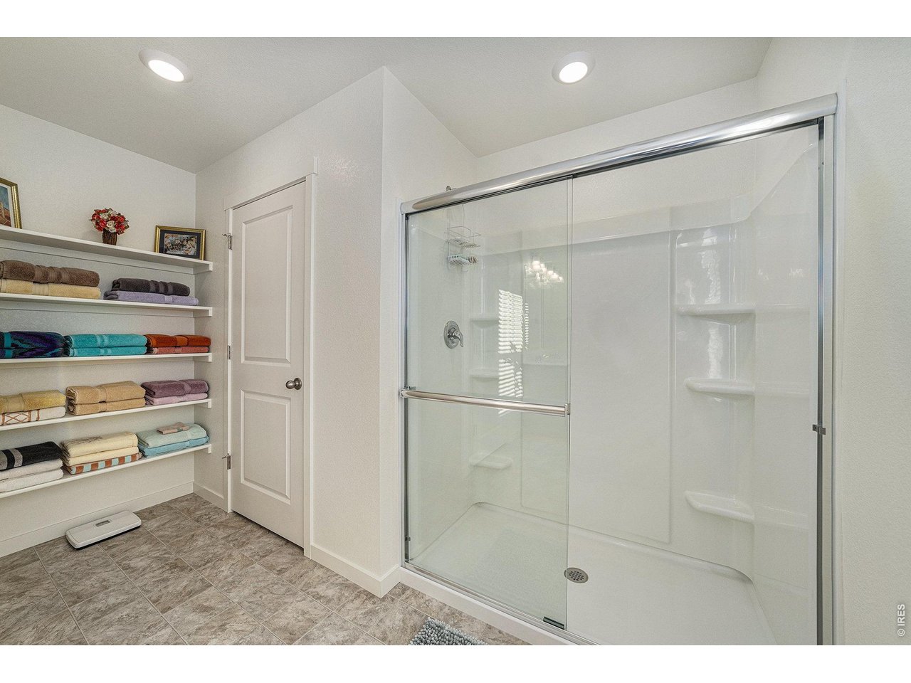 439 Bluebird Road Johnstown, CO 80534 - Photo 17 of 33 Primary shower with extra storage.