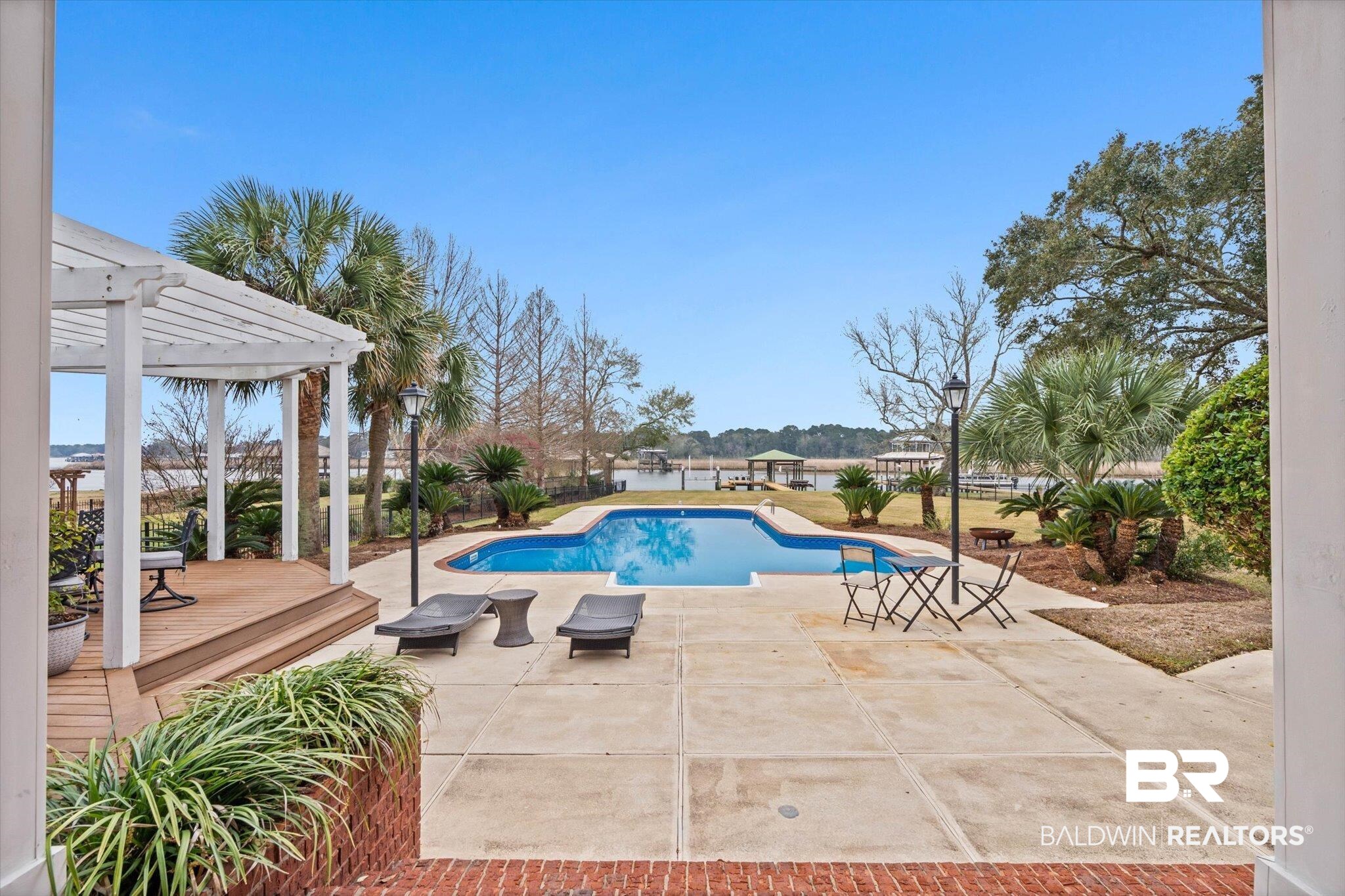 4851 Audubon Drive Mobile, AL 36619 - Photo 23 of 46 View of pool with a patio area, a deck, and a pergola