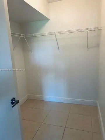 a view of small space with racks on the wall