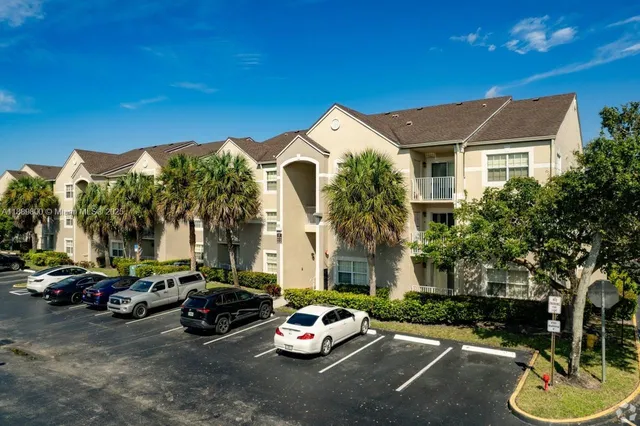 a car parked in front of a house