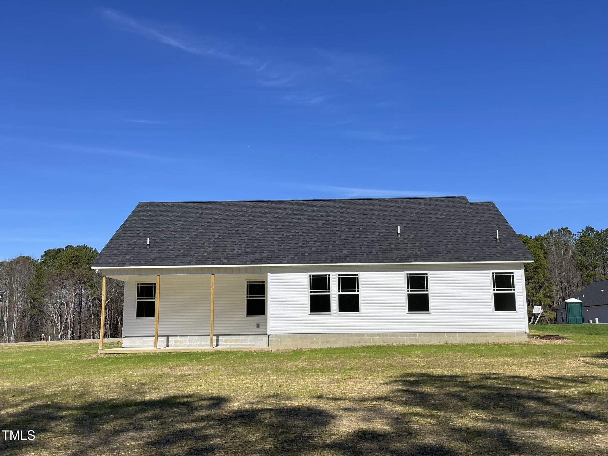 111 Magnolia Run Way Benson, NC 27504 - Photo 18 of 18 a house with swimming pool in front of it