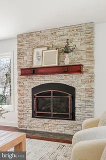 a kitchen with white cabinets stainless steel appliances and sink