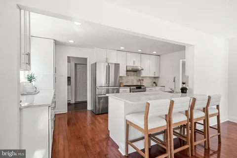 a kitchen with sink and window