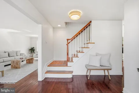 a view of entryway with wooden floor