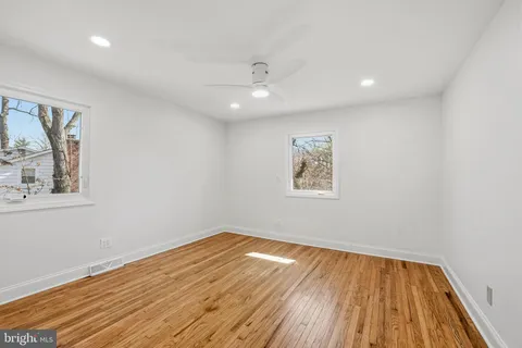 a view of living room with furniture and window