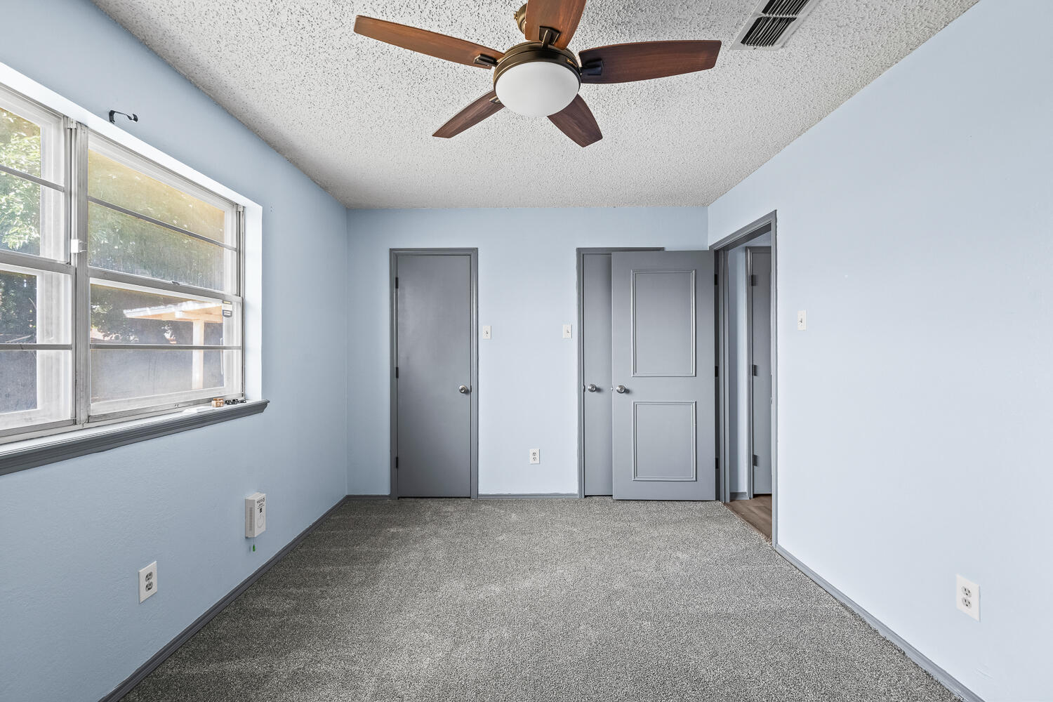 4809 72nd Street Lubbock, TX 79424 - Photo 27 of 34 a view of an empty room with a window