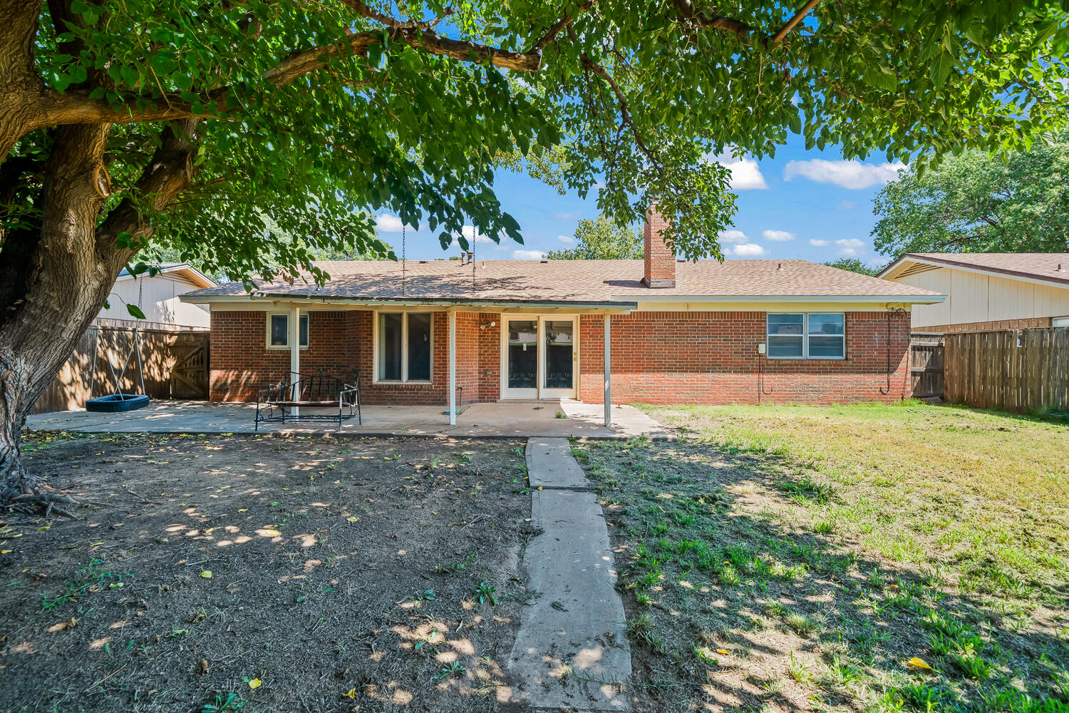4809 72nd Street Lubbock, TX 79424 - Photo 32 of 34 front view of a house with a yard