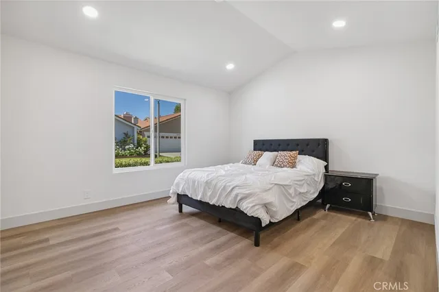 a view of a house with backyard porch and sitting area