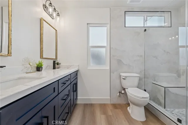 a view of a yard with plants and trees