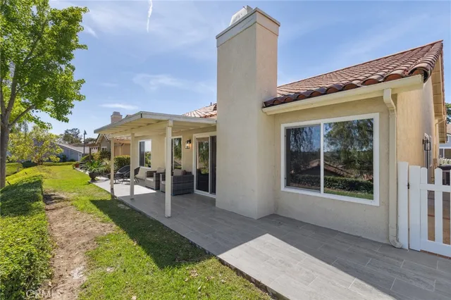 a view of a park with large trees
