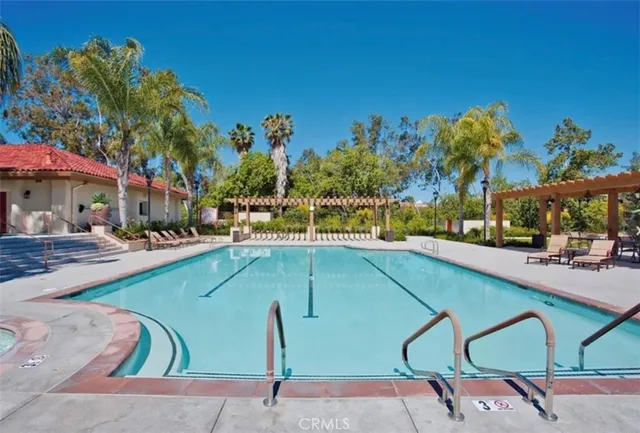 a room with furniture and pool table