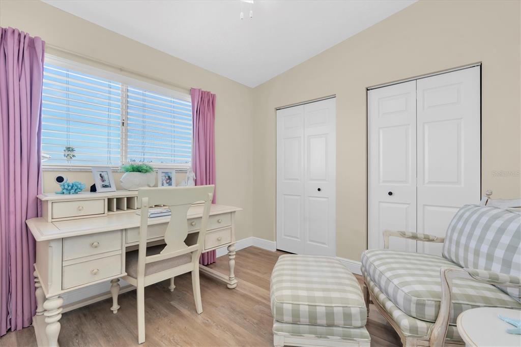 641 Garland Circle Indian Rocks Beach, FL 33785 - Photo 25 of 50 a living room with furniture and a window