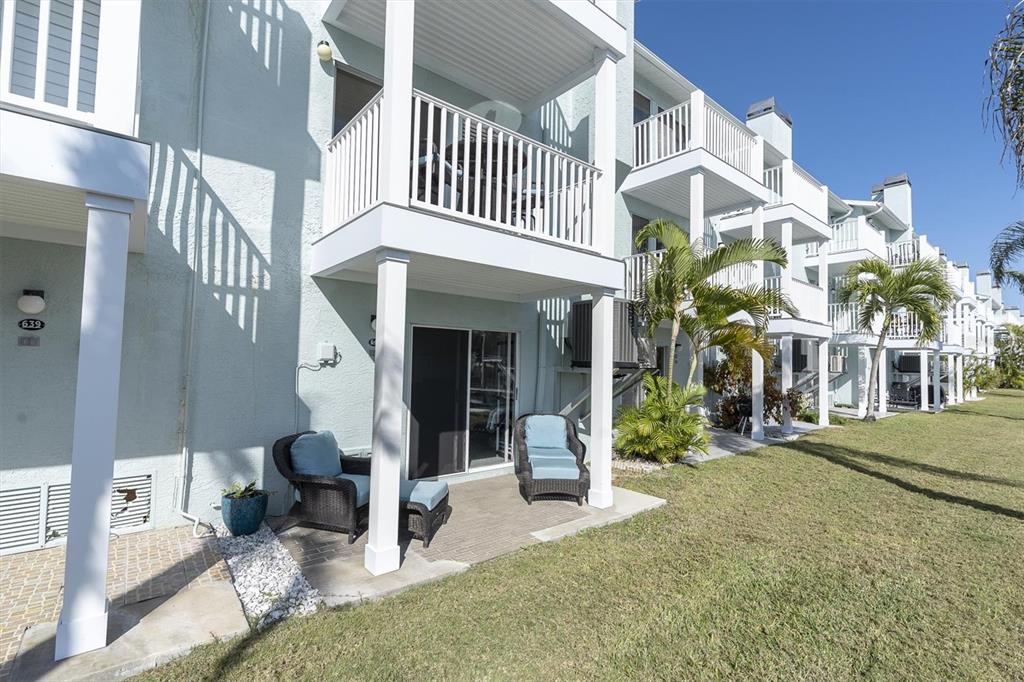 641 Garland Circle Indian Rocks Beach, FL 33785 - Photo 35 of 50 a view of a building with a patio