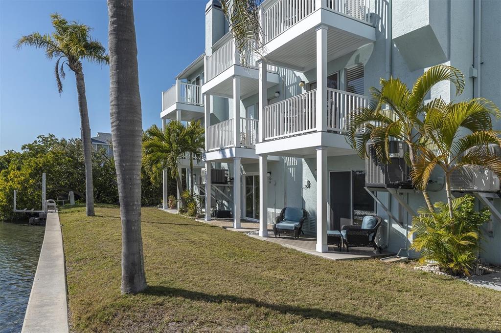 641 Garland Circle Indian Rocks Beach, FL 33785 - Photo 36 of 50 a view of a house with a yard