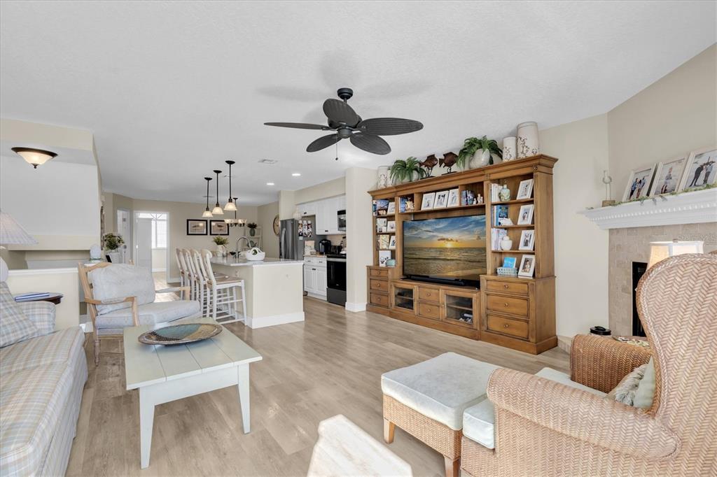641 Garland Circle Indian Rocks Beach, FL 33785 - Photo 10 of 50 a living room with furniture and a flat screen tv