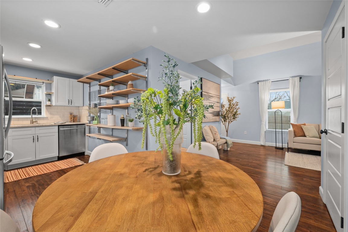 1191 Chicon Street Austin, TX 78702 - Photo 11 of 33 Dining area featuring dark wood-style floors and recessed lighting