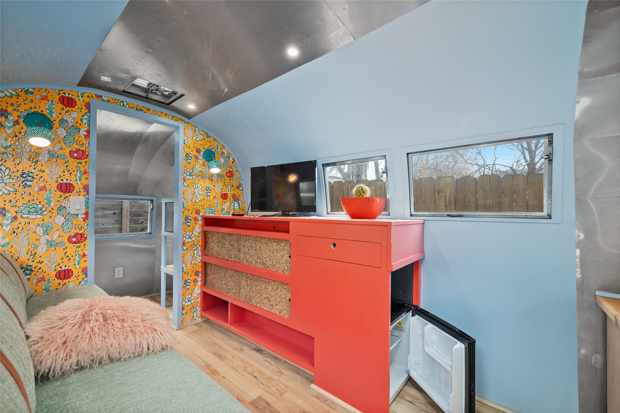 1191 Chicon Street Austin, TX 78702 - Photo 25 of 33 a bed room with a bed and a large mirror