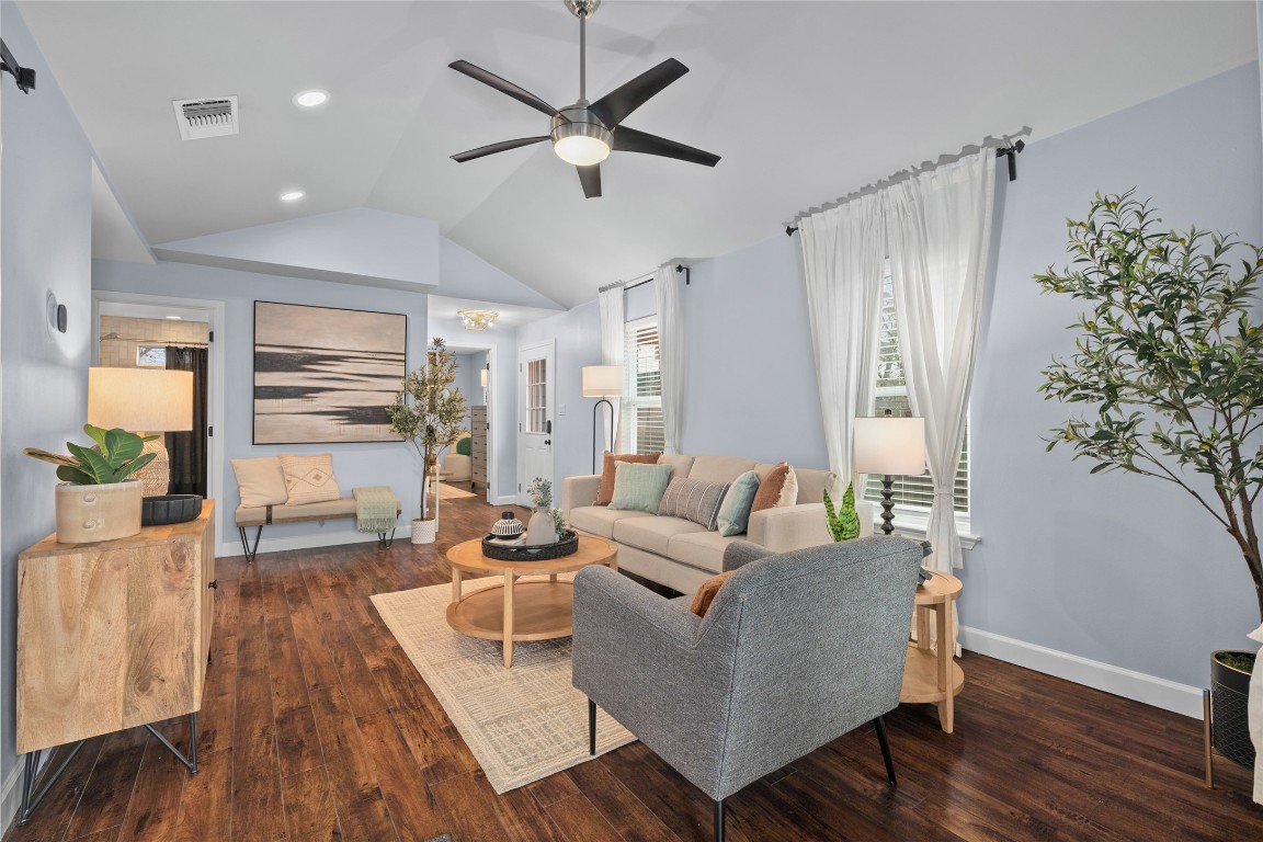 1191 Chicon Street Austin, TX 78702 - Photo 5 of 33 Living area featuring vaulted ceiling, dark wood-style floors, ceiling fan, and recessed lighting