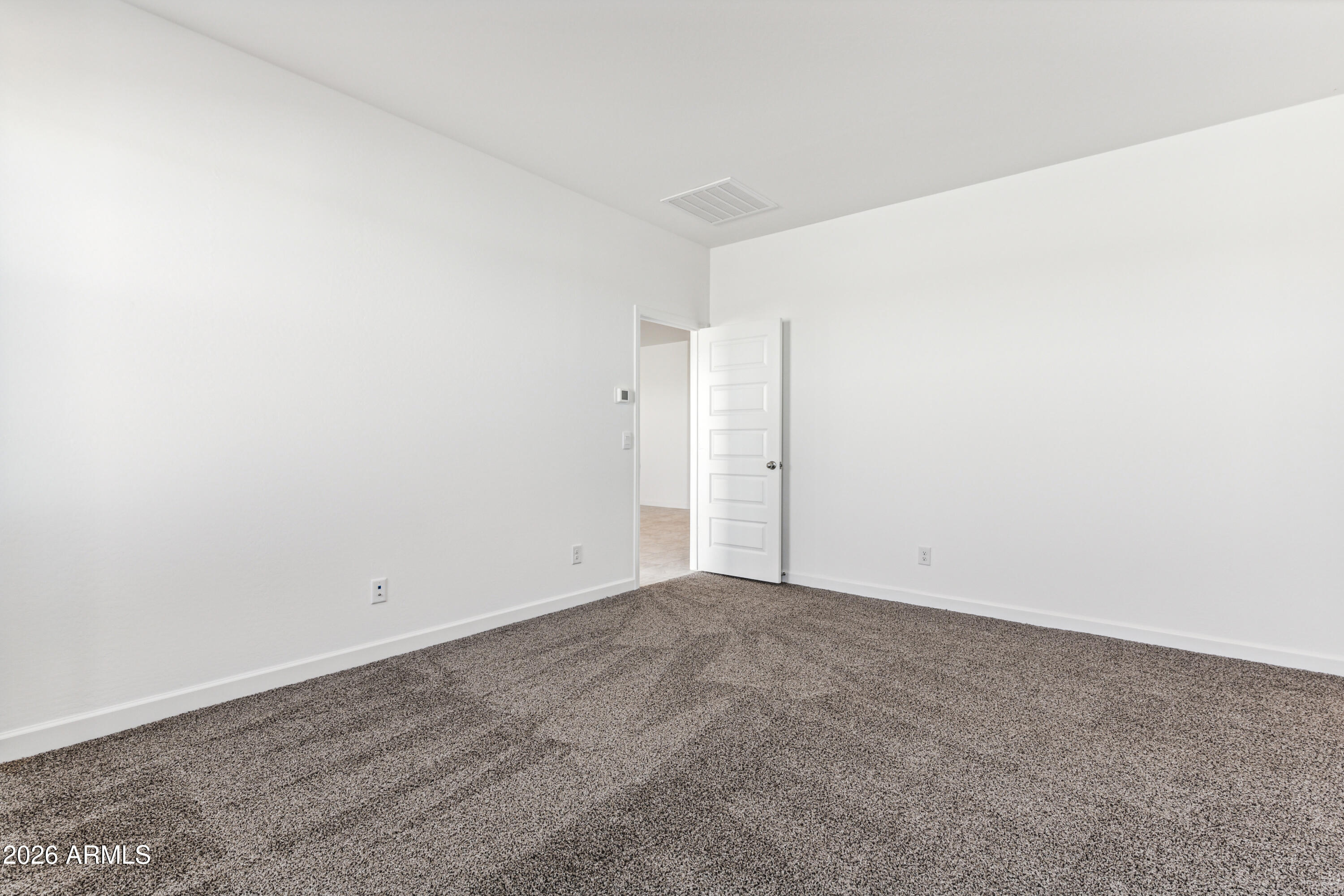 17885 North Ravello Road Maricopa, AZ 85138 - Photo 11 of 35 a view of an empty room