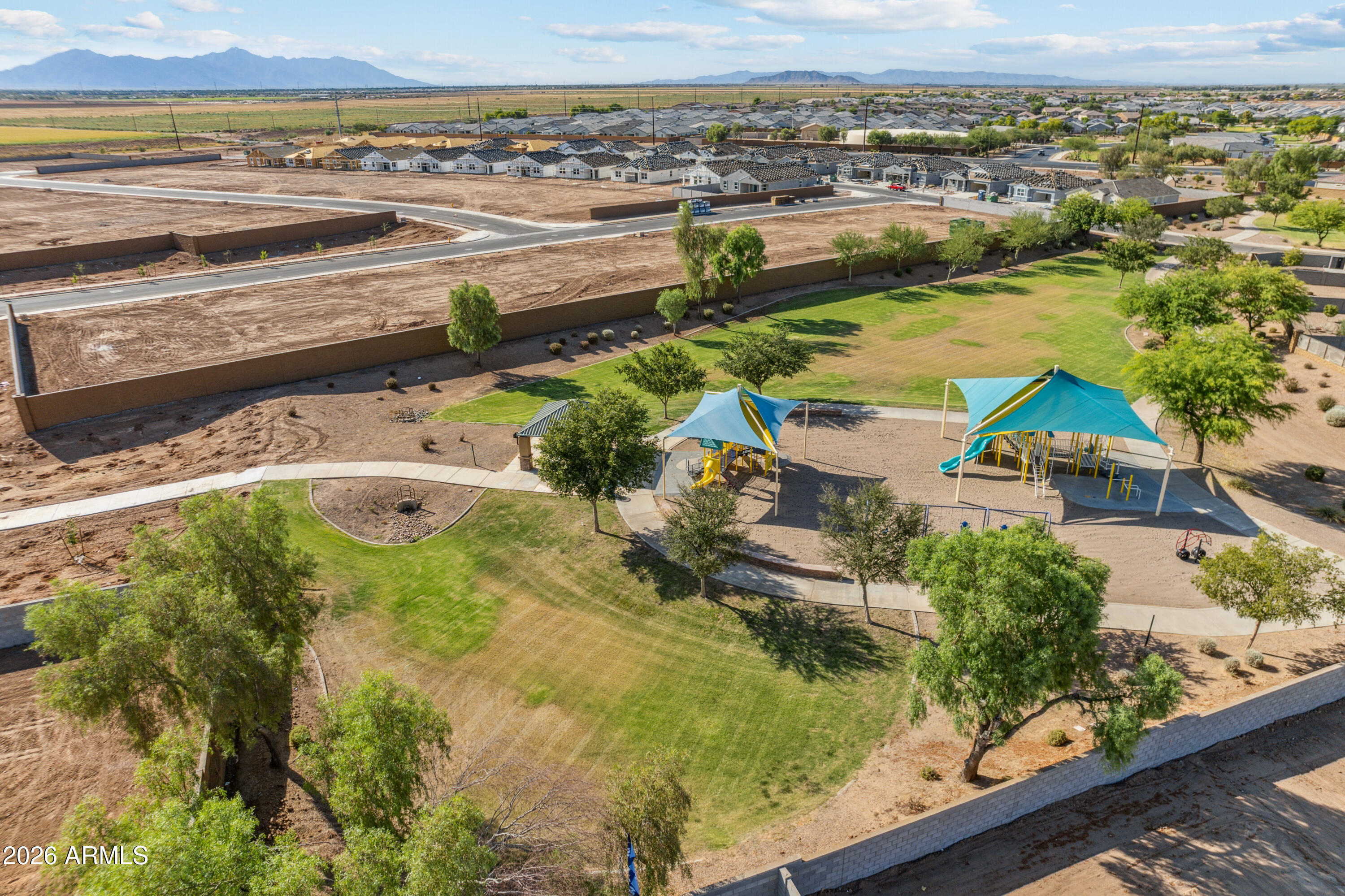17885 North Ravello Road Maricopa, AZ 85138 - Photo 23 of 35 an aerial view of residential houses with outdoor space