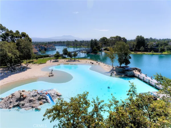 an aerial view of a house with a ocean view